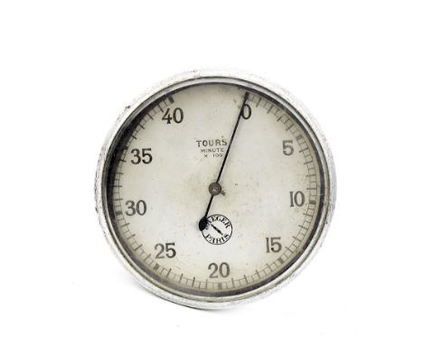 A Jaeger Paris rev counter,printed metallic dial, 0-40 tours minute x 100, 78cm diameter bevelled glass lens, cast alloy case