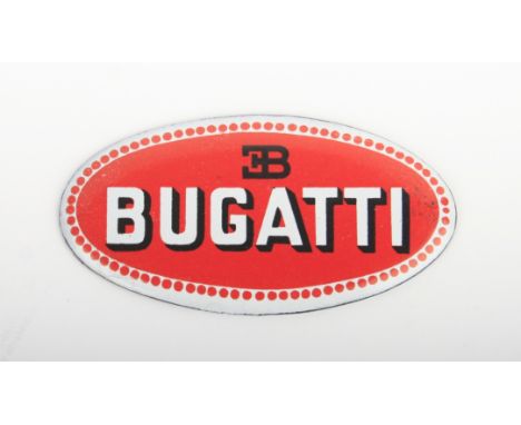 An enamel Bugatti radiator badge,in red, black and white on convex steel plate, 47 x 90mm. Footnotes:This badge was purchased