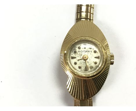 A vintage ladies 9ct gold Rotary watch with box and guarantee paperwork. Not seen running. 20.6g total weight.