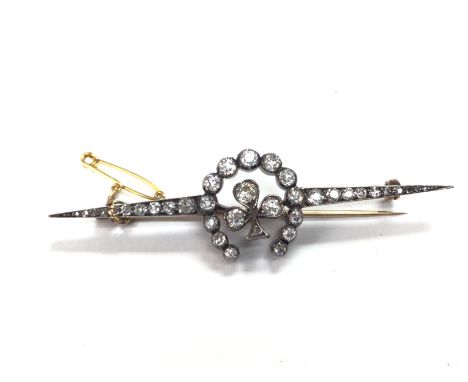 A vintage diamond brooch 65mm wide. 7.7g