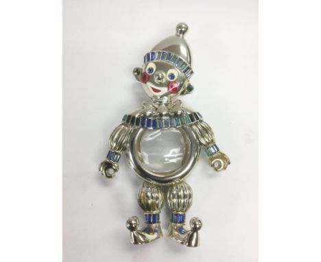 A Chopard silver perfume bottle in the form of a clown, approx height 20cm. Comes with original bag. Shipping category D.