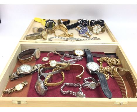 A large collection of fashion and vintage watches. Postage B