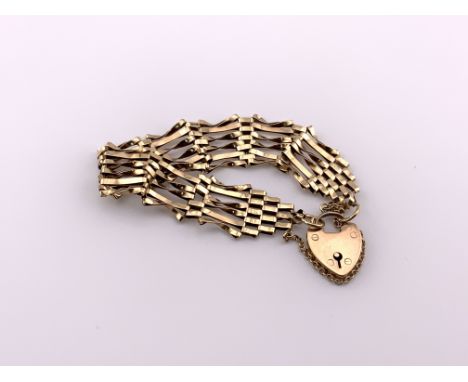 A 9ct gold 6 bar gate bracelet, 13.68g. (A)