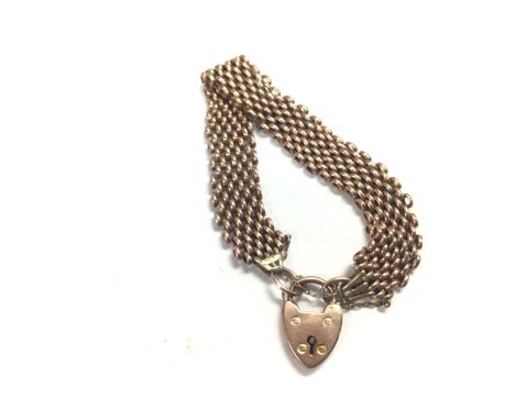 A 9ct gold gate bracelet. 20g Postage A