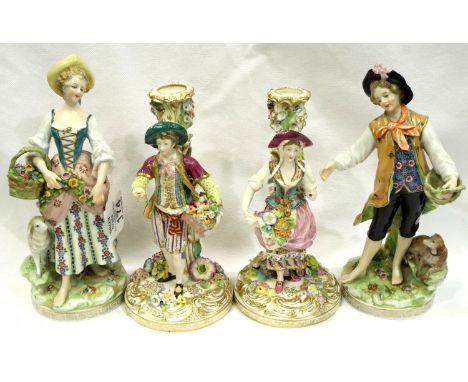 Pair of 19th century Continental figural candlesticks (each with faults) and a pair of later Continental figures, largest H: 