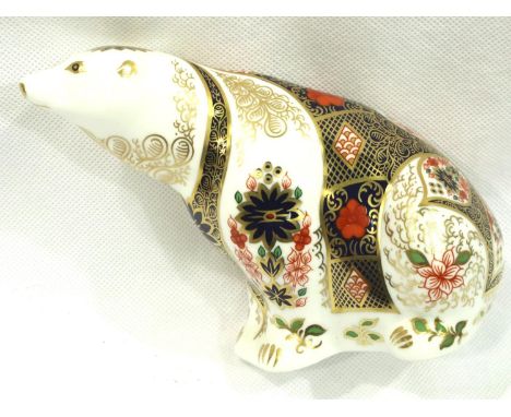 Royal Crown Derby Polar bear with silver button, H: 90 mm. P&amp;P Group 2 (£18+VAT for the first lot and £3+VAT for subseque