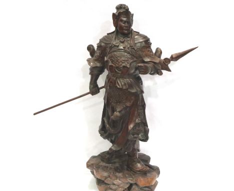 Carved Oriental warrior with stone eyes, H: 45 cm. P&amp;P Group 3 (£25+VAT for the first lot and £5+VAT for subsequent lots)
