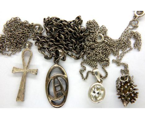 Four 925 silver pendant necklaces including a cross example, combined 18g. P&amp;P Group 1 (£14+VAT for the first lot and £1+