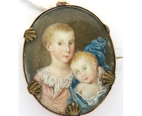 Antique miniature double portrait brooch/pendant in yellow metal mount, L: 40 mm. P&amp;P Group 1 (£14+VAT for the first lot 