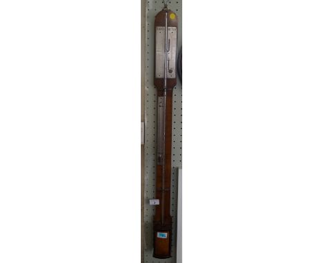 A 19th Century Austrian stick barometer, walnut veneered with silvered dial and sliding Vernier scales, signed C. Fritsch Wie