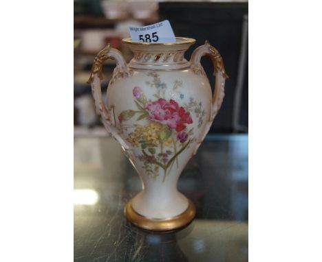 A Royal Worcester blush ivory twin handled urn vase and cover, having hand-painted floral decoration, with internal cover, pu