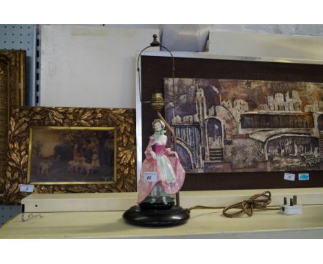 A Royal Doulton figurine table lamp raised on a wooden plinth base (sold electrically untested) 