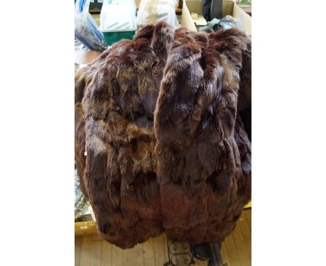 A mixed lot of assorted vintage clothing to include two fur coats 