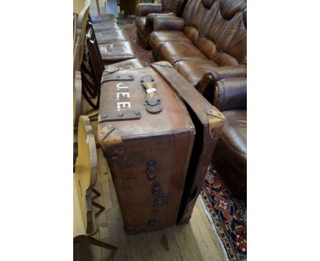 A good quality early 20th Century Vintage leather travel trunk, stamps John Pound & Co of London, the hinged lid enclosing fi