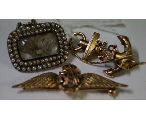 An RAF enamel and gold sweetheart brooch Of conventional form, decorated in red and green, stamped 9ct, length 5cm, together 
