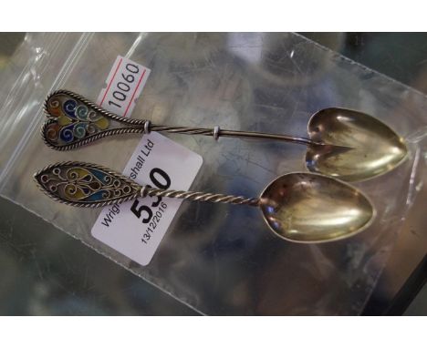 Two sterling silver spoons with enamelled finials (2).