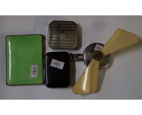 A green enamel white metal cigarette caseTogether with, a vintage manual fan, with to other cases (4)