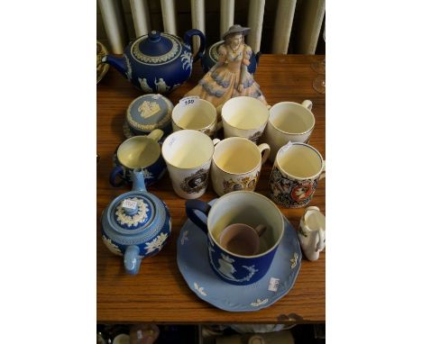 A mixed lot of assorted ceramics to include a Wedgwood blue jasper ware tea service, Laura Knight commemorative tankard etc  