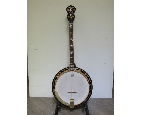 An Ashbury tenor banjo, gold coloured hard case, mother of pearl inlaid fingerboard 