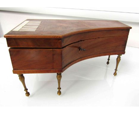 A lady's musical boudoir piano-shaped sewing box, the velvet lined fitted and mirrored interior containing miscellaneous late