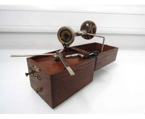 An oak case camera phone with tortoiseshell effect sound box