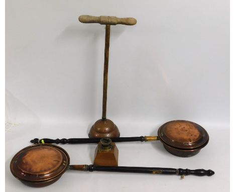 Two copper bed warmers, a copper lamp base & a Simplex no.9 copper posser