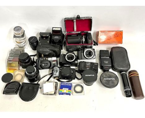 A quantity of various camera equipment including two Canon EOS400D, a Minolta 7000AF, a Tamron SP500mm, Pentax 35-70mm lens, 