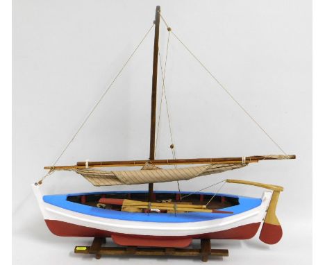 A hand made mounted model of a vintage Cornish fishing boat, 24.5in long x 24in high