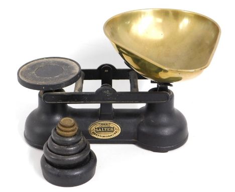 A pair of Salter scales with weights