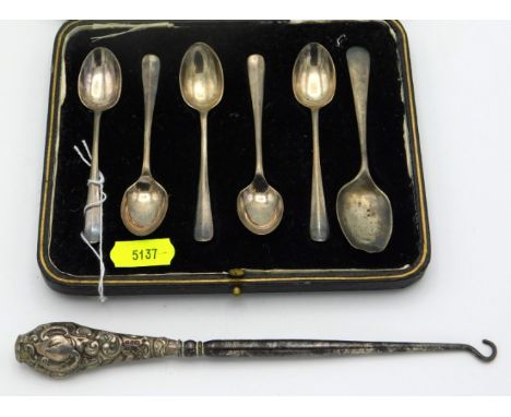 A case of five 1927 Copper Bros. Sheffield silver teaspoons & one other, 51.5g, twinned with a silver handled button hook 