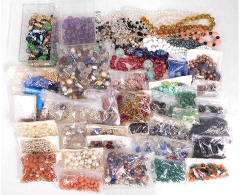 A large quantity of vintage mixed beads including antique, amethyst, glass & jade