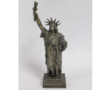 A vintage novelty statue of Liberty table lighter, hinge detached on head, repairable, 10in tall