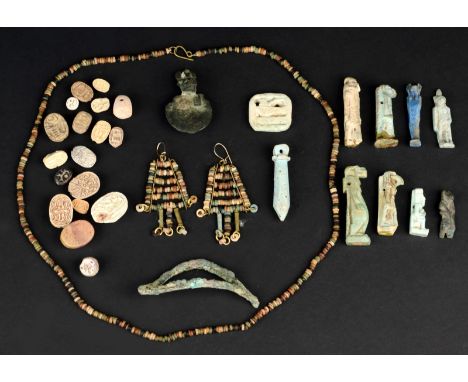 Nine Egyptian faience amulets Late Period, 664 - 331BC including five walking deities; ram, ibis, falcon, Thoeris and lion; a