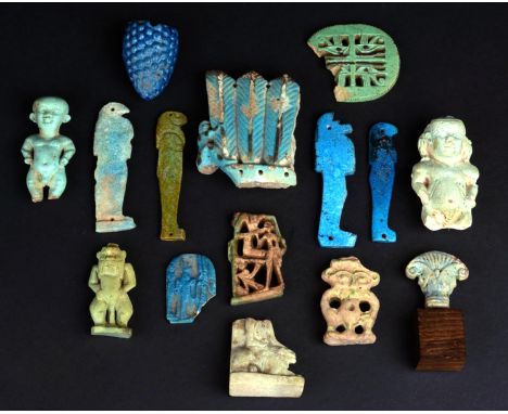 A group of Egyptian antiquities Late Period, circa 664 - 332BC faience including two figures of Bes, two amulet figures of Pa