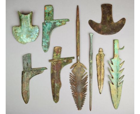 A group of nine archaistic blades mainly bronze, including three Chinese halberds, two axe heads and three spear tips, the lo