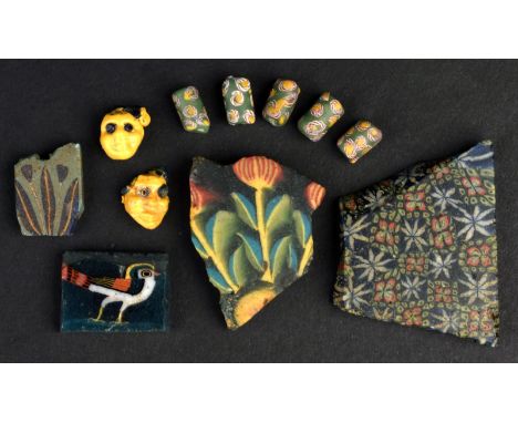 Three Egyptian mosaic glass fragments Ptolemaic Period, circa 332 - 30BC including a bird, two floral panels, a later millefi