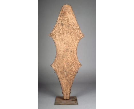 A Mfunte iron currency blade Nigeria of waisted form, 64cm high, on a stand. (2) Provenance Ian Auld, London.