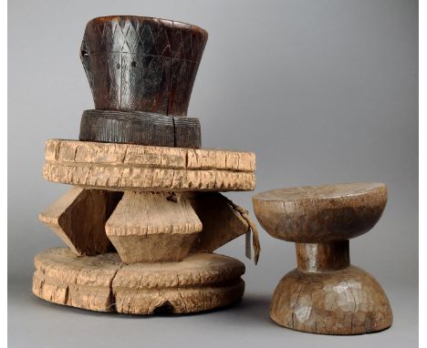 A Lega stool Democratic Republic of Congo wood with four angled supports, 23cm high, and a smaller stool of dumbbell form, 18