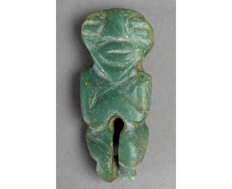 A Maya amulet Mesoamerica jade of figural form with the arms laid to the chest, pierced for attachment through the neck, 4.6c