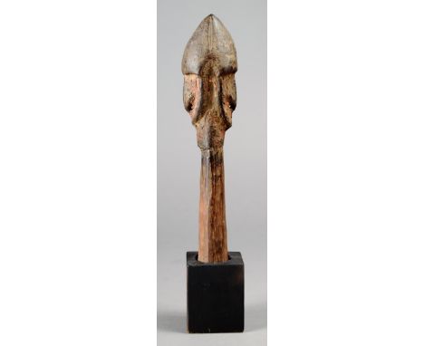 A Sepik River Janus staff finial Papua New Guinea wood, with encrusted patina, 19.6cm high, mounted. (2) Provenance The David