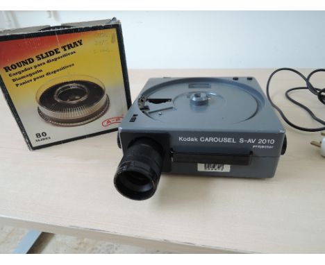 A Kodak Carousel S-AV2010 side projector and slide carousels