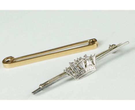 A 15ct gold tie pin together with a sterling silver Royal Navy tie pin. 