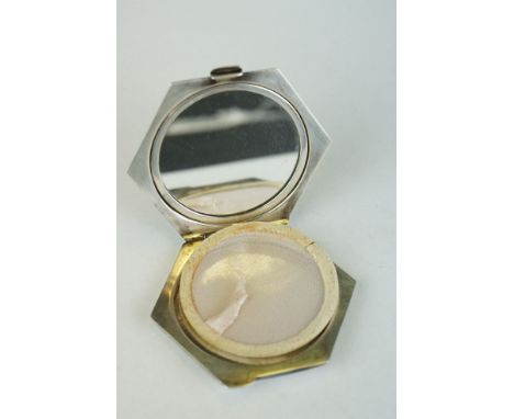 Silver compact with engine turned decoration 