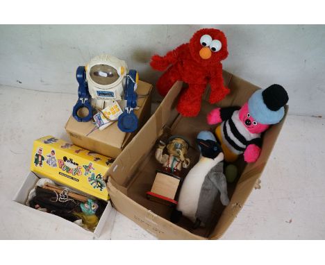 A group of collectable toys to include a dancing Elmo, smoking Barman, Pelham puppet and a Palbot remote control robot. 