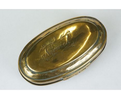 An antique brass oval snuff box, marked 1516 to the lid and Norwich to the base.. 