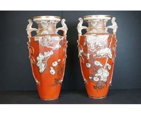 Pair of ceramic Japanese twin-handled vases with prunus decoration, signed to base 