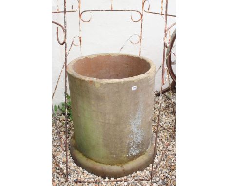 A large industrial stone pipe, suitable for use as an oversized garden planter. Stands approx 80cm in height. 