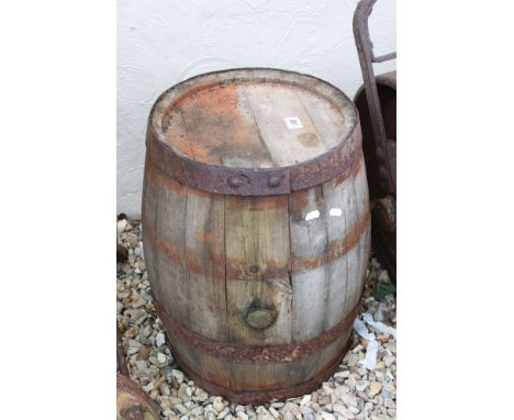 A vintage wooden coopered barrel, stands approx 54cm in height. 