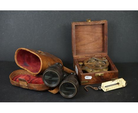 A small group of collectables to include a pair of field binoculars, a cased compass and a set of pocket balance scales. 