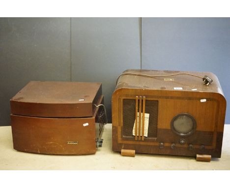 A vintage wooden cased HMV radio together with a wooden cased Monarch record player. 